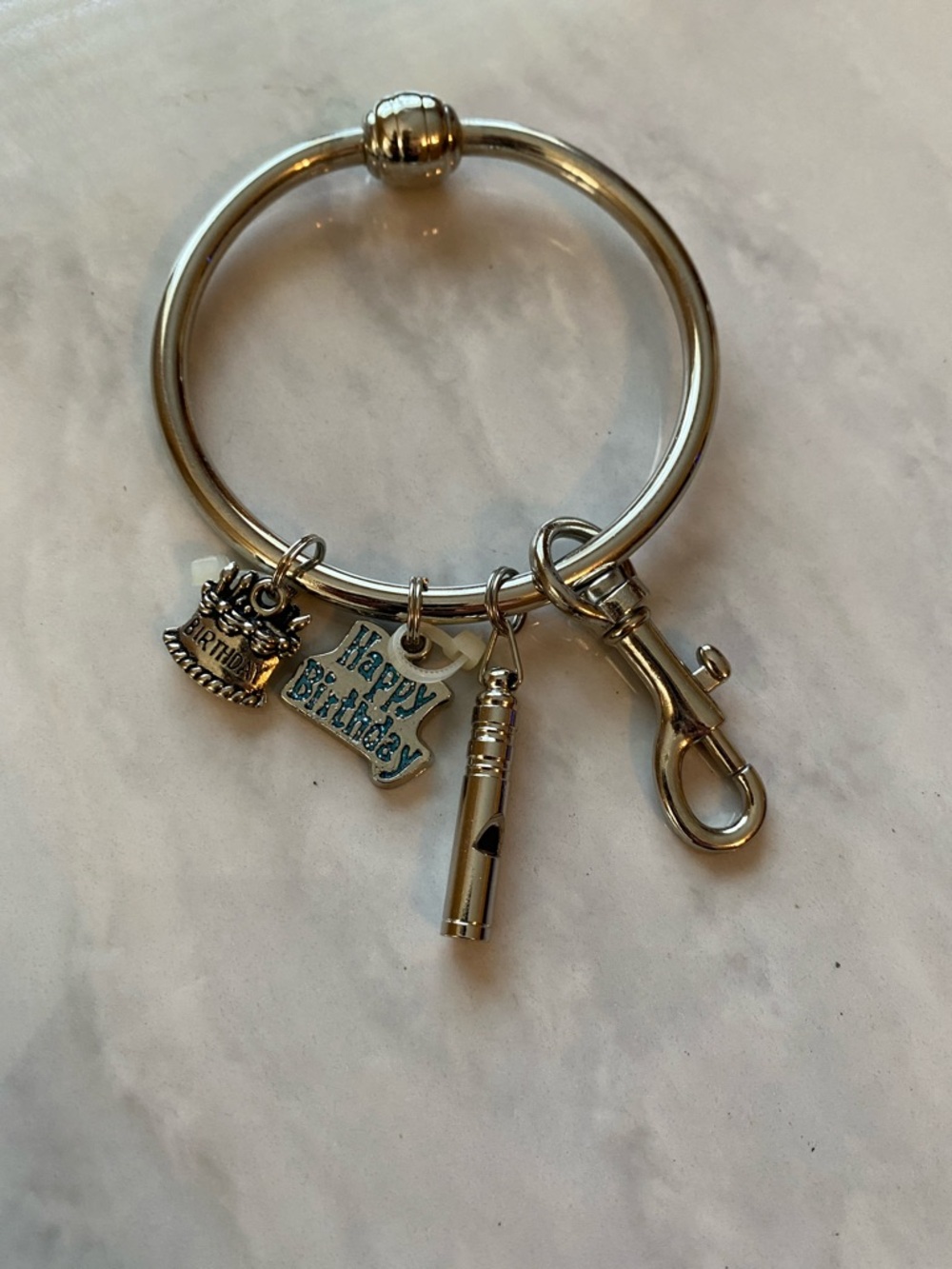 Key bracelet with charms